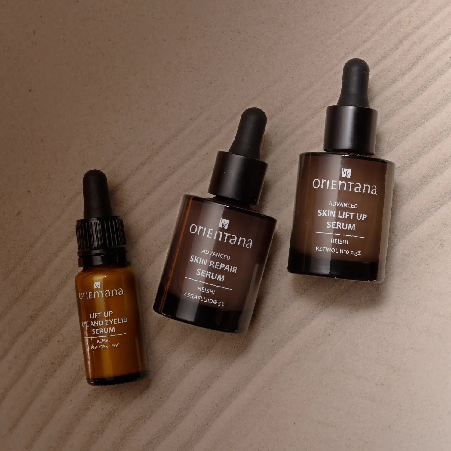 trzy produkty z reishi: serum z retinolem, serum z ceramidami, serum z peptydami pod oczy i na powieki.